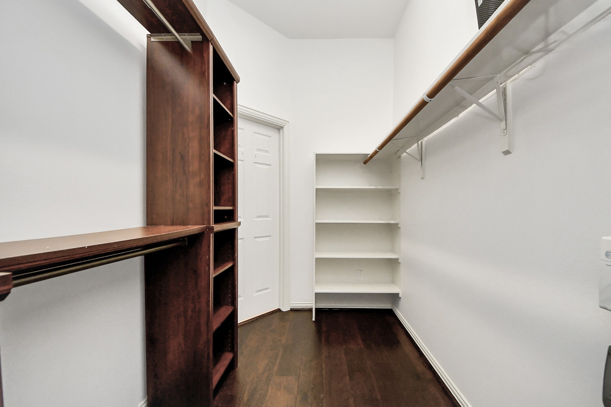 2907 Bright Sky Court Spring, TX 77386 - Photo 19 of 27 a view of walk in closet with empty racks