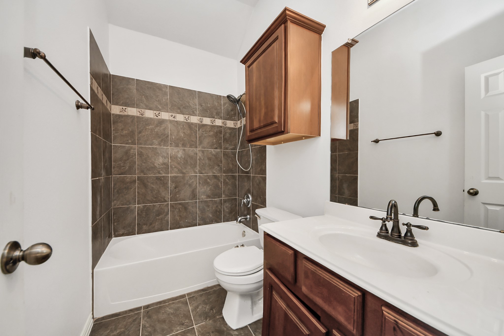 2907 Bright Sky Court Spring, TX 77386 - Photo 22 of 27 a bathroom with a sink a toilet and bathtub