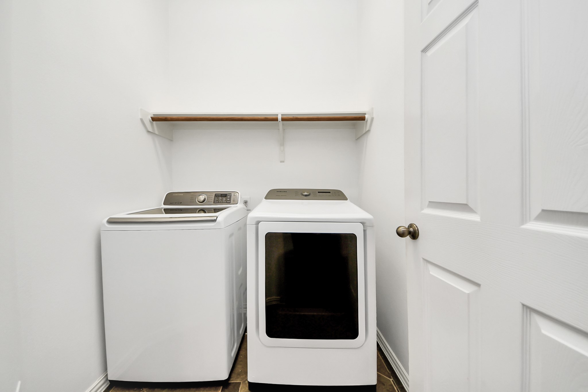2907 Bright Sky Court Spring, TX 77386 - Photo 23 of 27 a utility room with dryer and washer