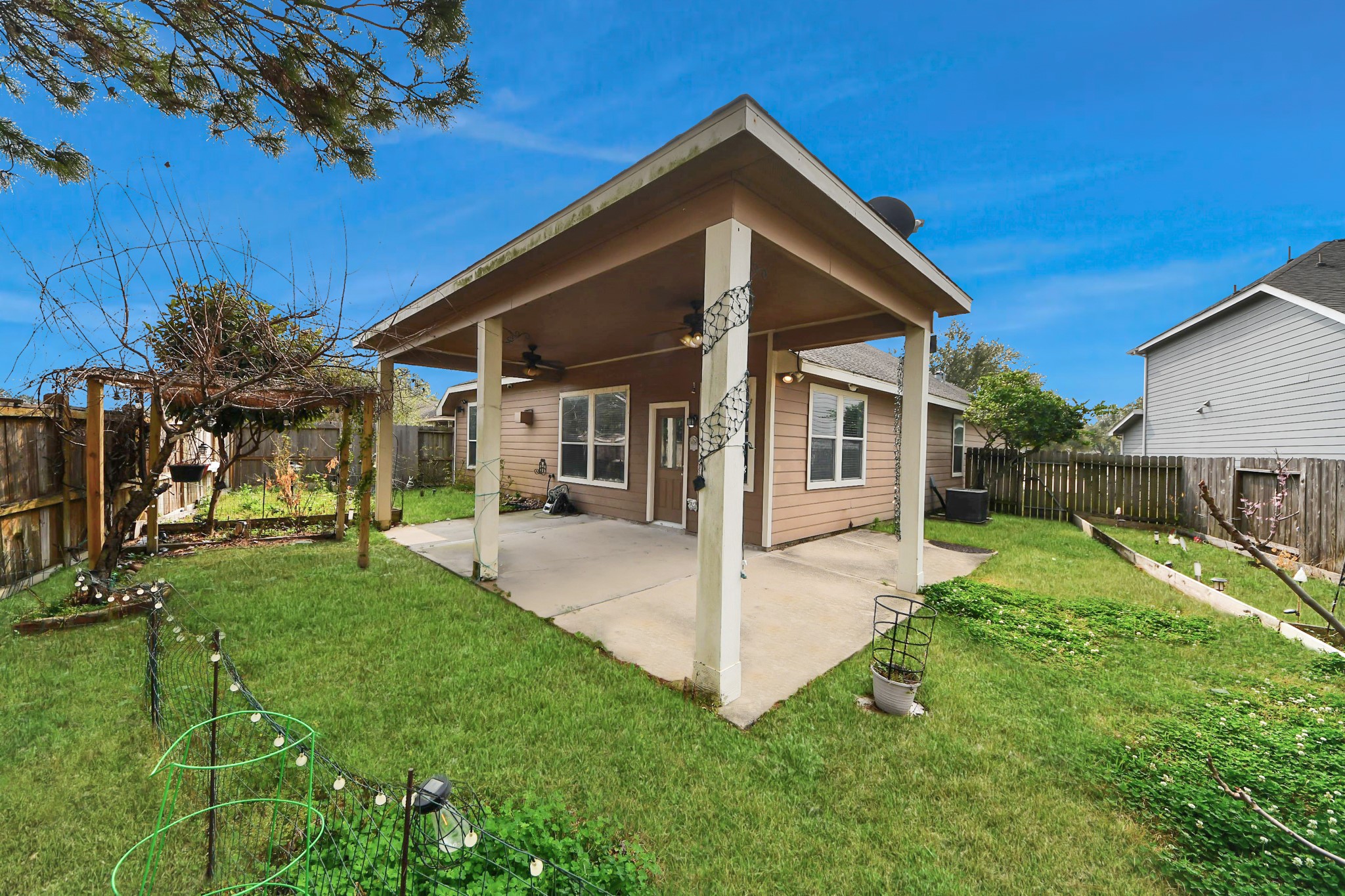 2907 Bright Sky Court Spring, TX 77386 - Photo 26 of 27 a view of a house with a yard