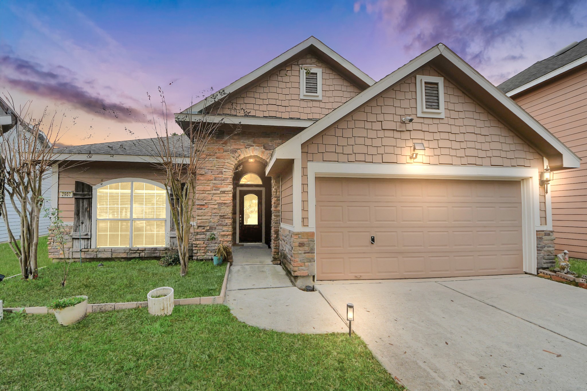 2907 Bright Sky Court Spring, TX 77386 - Photo 27 of 27 a front view of a house with garage