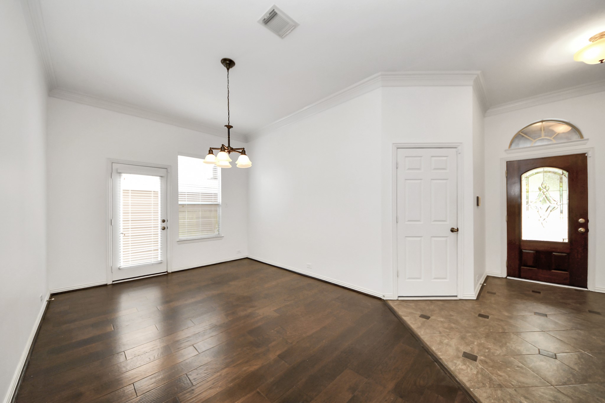 2907 Bright Sky Court Spring, TX 77386 - Photo 3 of 27 a view of empty room with wooden floor and fan