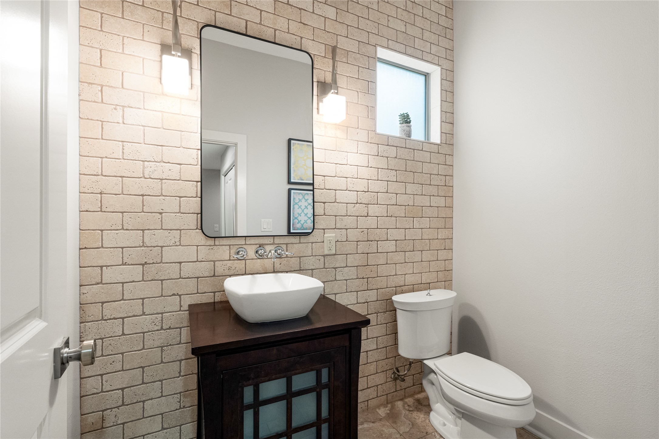3814 Ridgelea Drive, Unit A Austin, TX 78731 - Photo 16 of 30 a bathroom with a toilet a sink and mirror