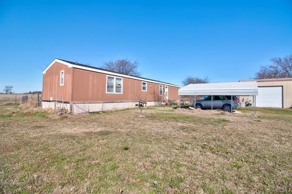 a house view with a outdoor space