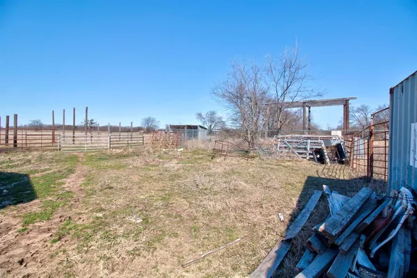 a view of yard with outdoor seating