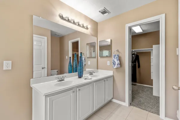 a view of a house with backyard and porch