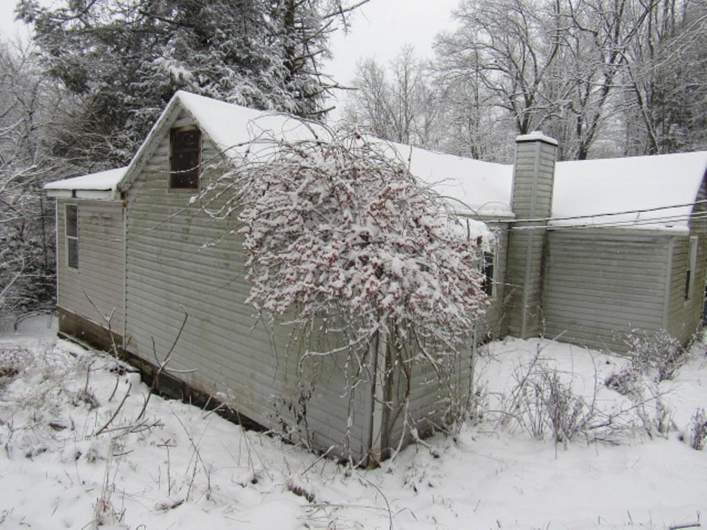 6000 Station Hill Road Gibsonia, PA 15044 - Photo 3 of 18 a view of a house with a yard covered in snow