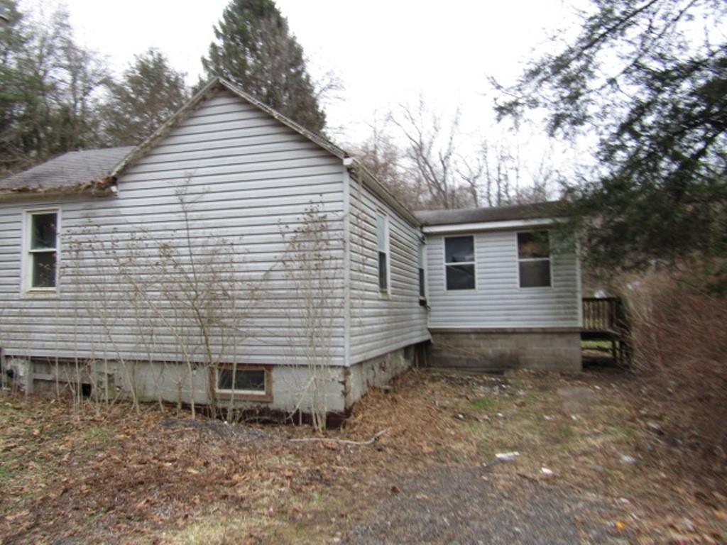 6000 Station Hill Road Gibsonia, PA 15044 - Photo 3 of 23 a view of a house with a yard and wooden fence