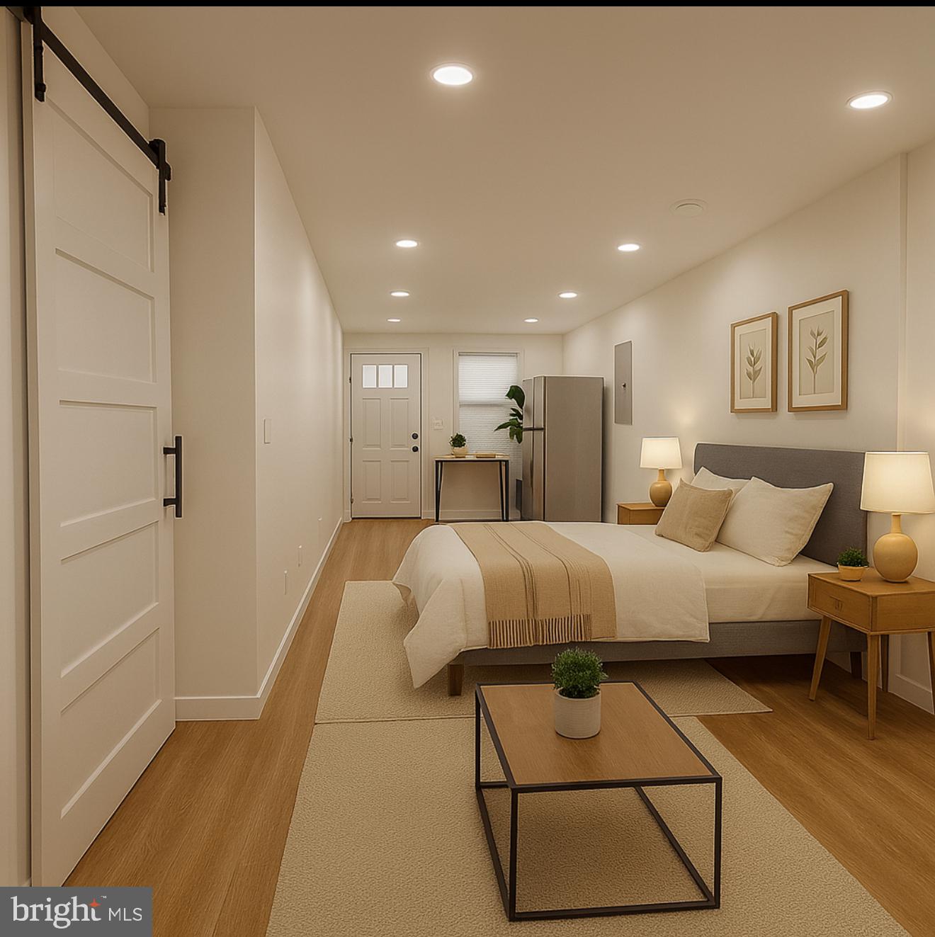 1153 Atwood Road, Unit 2 Philadelphia, PA 19151 - Photo 1 of 29 a bed room with a bed and a couch