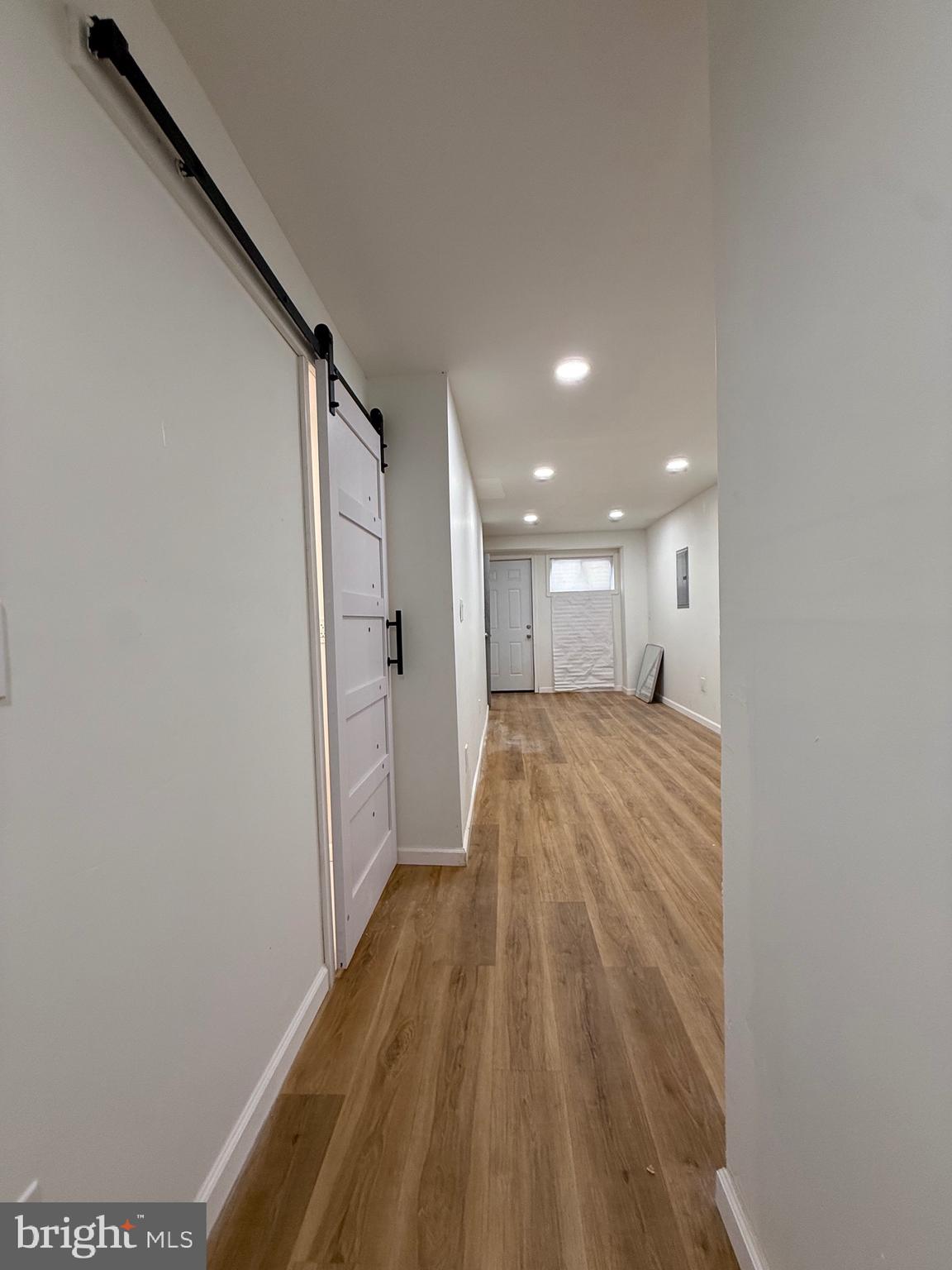 1153 Atwood Road, Unit 2 Philadelphia, PA 19151 - Photo 20 of 29 a view of hallway with wooden floor