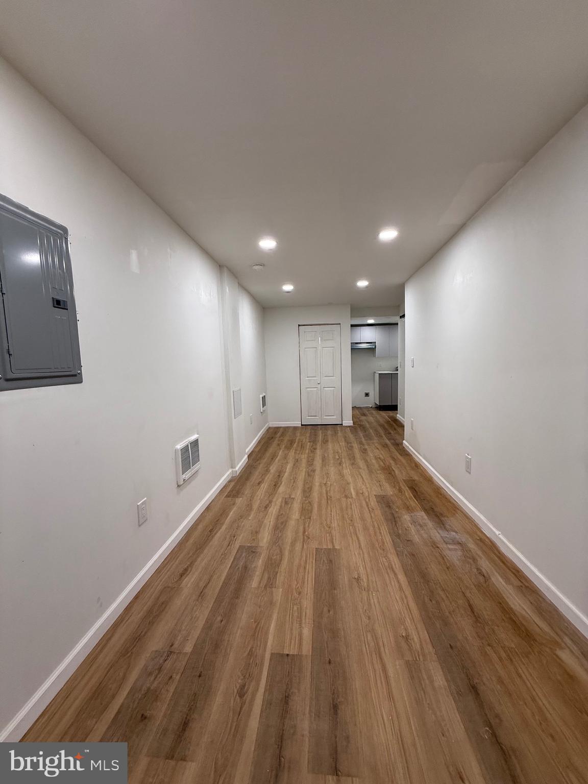 1153 Atwood Road, Unit 2 Philadelphia, PA 19151 - Photo 23 of 29 a view of empty room with wooden floor