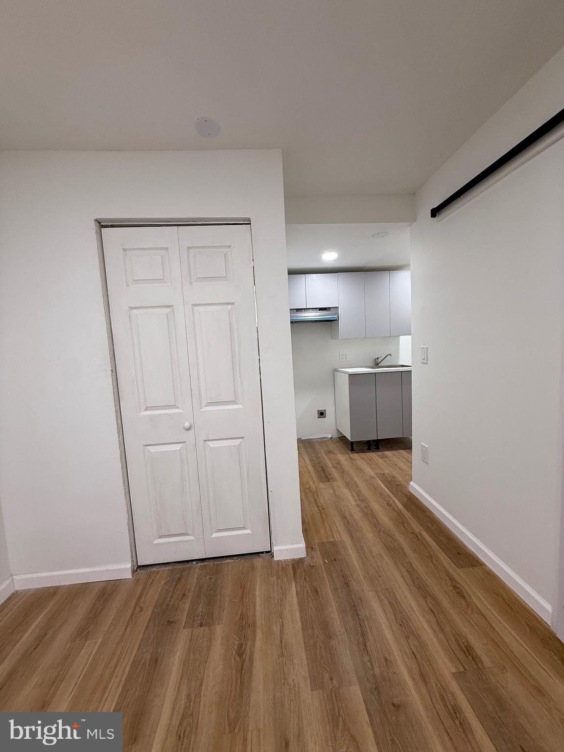 1153 Atwood Road, Unit 2 Philadelphia, PA 19151 - Photo 26 of 29 a view of empty room with wooden floor