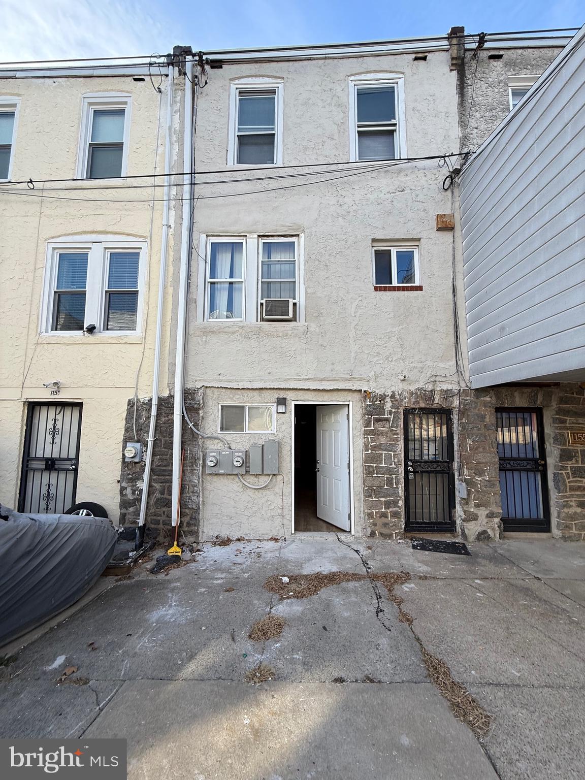 1153 Atwood Road, Unit 2 Philadelphia, PA 19151 - Photo 27 of 29 a view of a brick building with many windows
