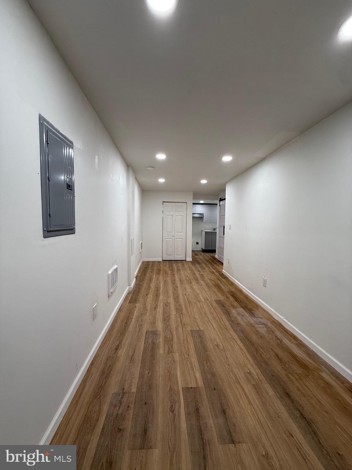 1153 Atwood Road, Unit 2 Philadelphia, PA 19151 - Photo 8 of 29 a view of empty room with wooden floor