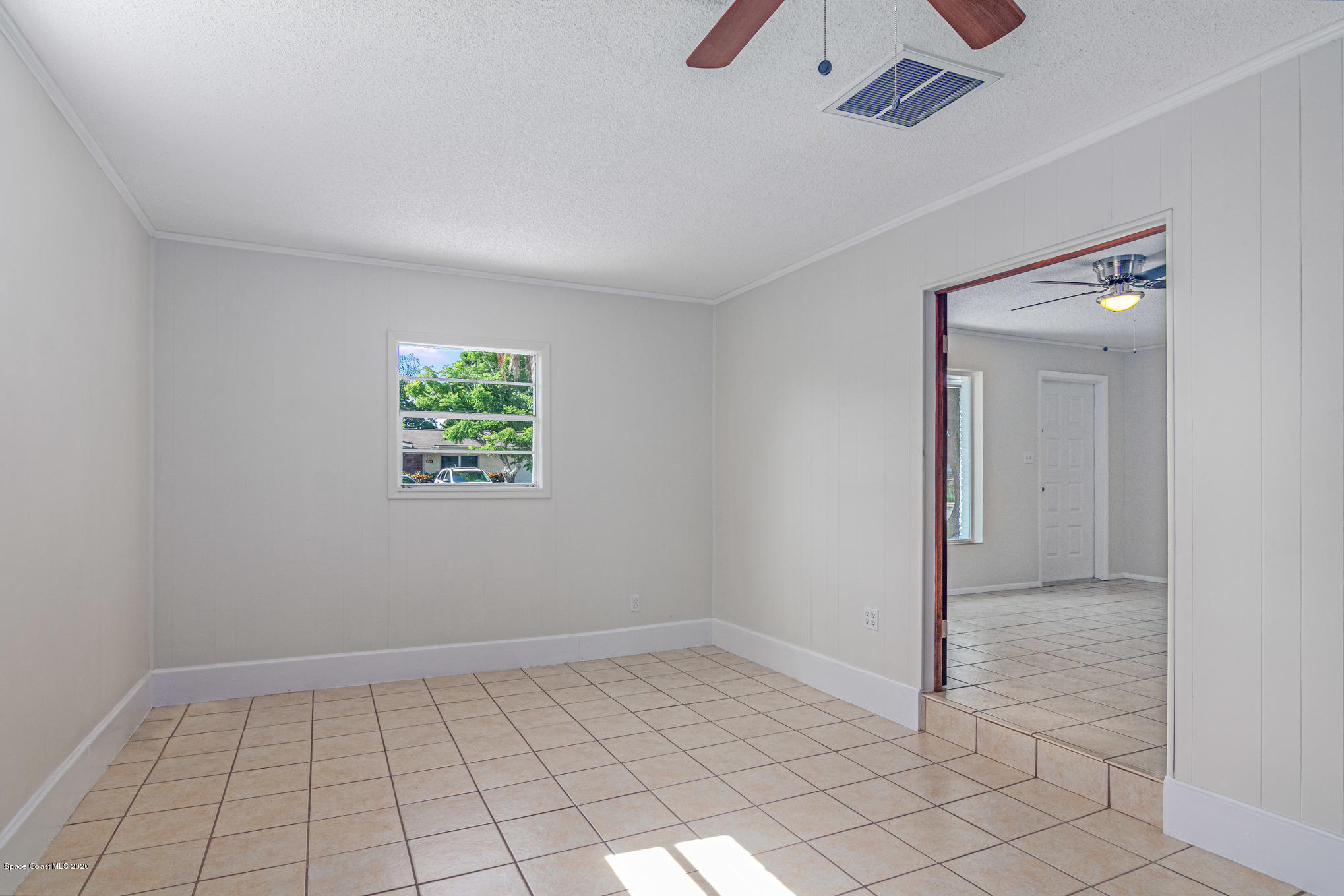 434 Count Street Melbourne, FL 32901 - Photo 12 of 26 a view of an empty room and window