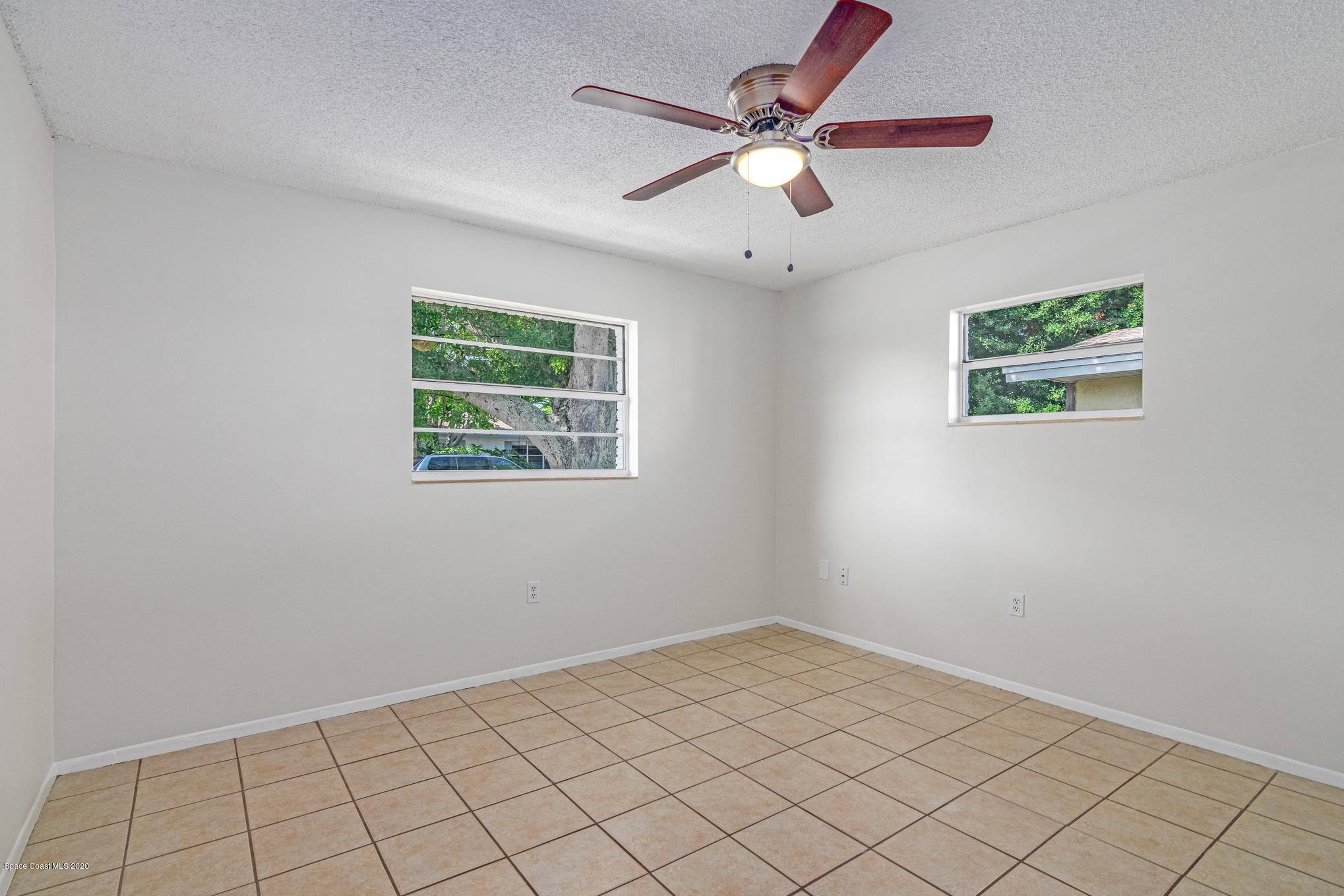 434 Count Street Melbourne, FL 32901 - Photo 18 of 26 an empty room with a window