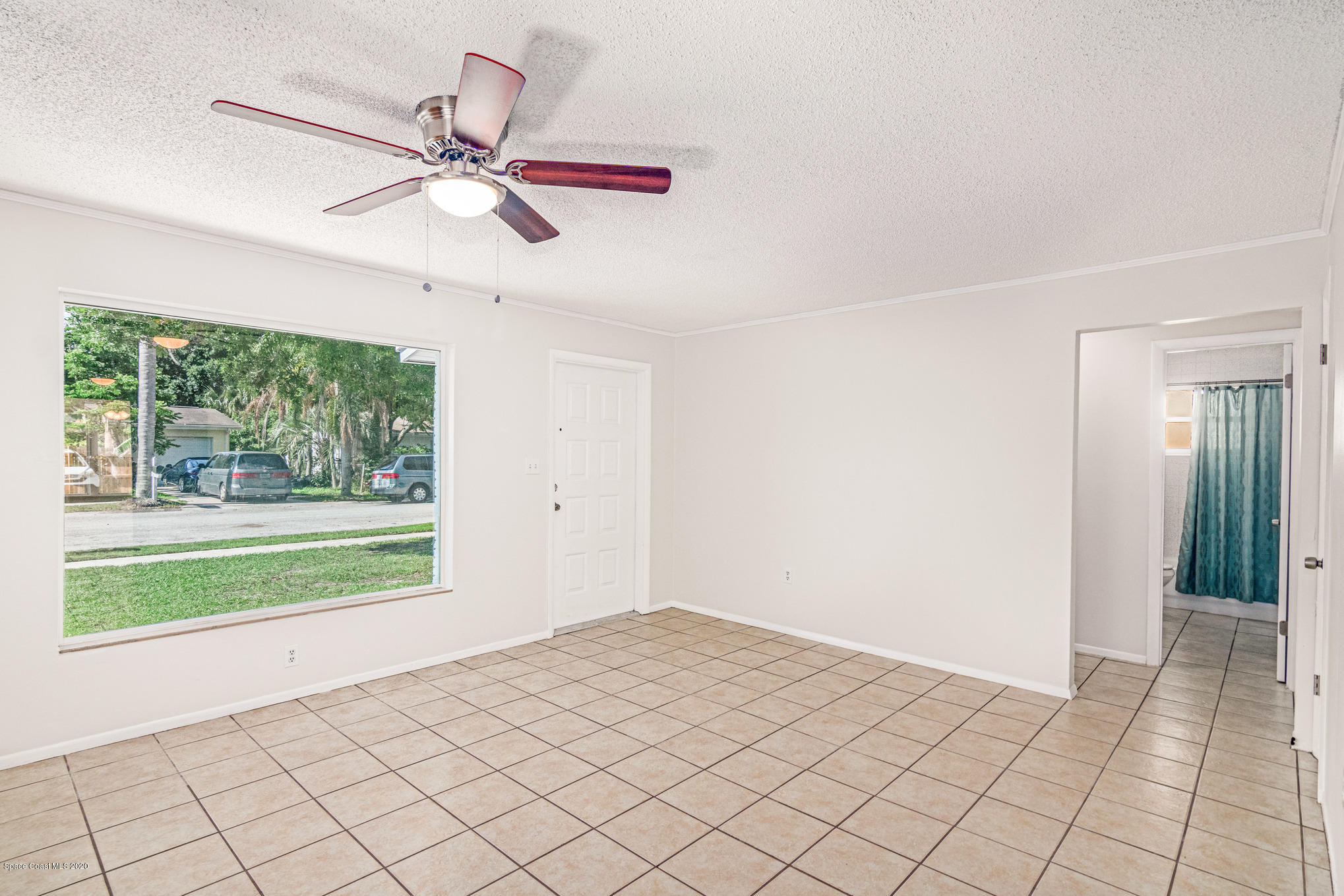 434 Count Street Melbourne, FL 32901 - Photo 3 of 26 a view of an empty room and window