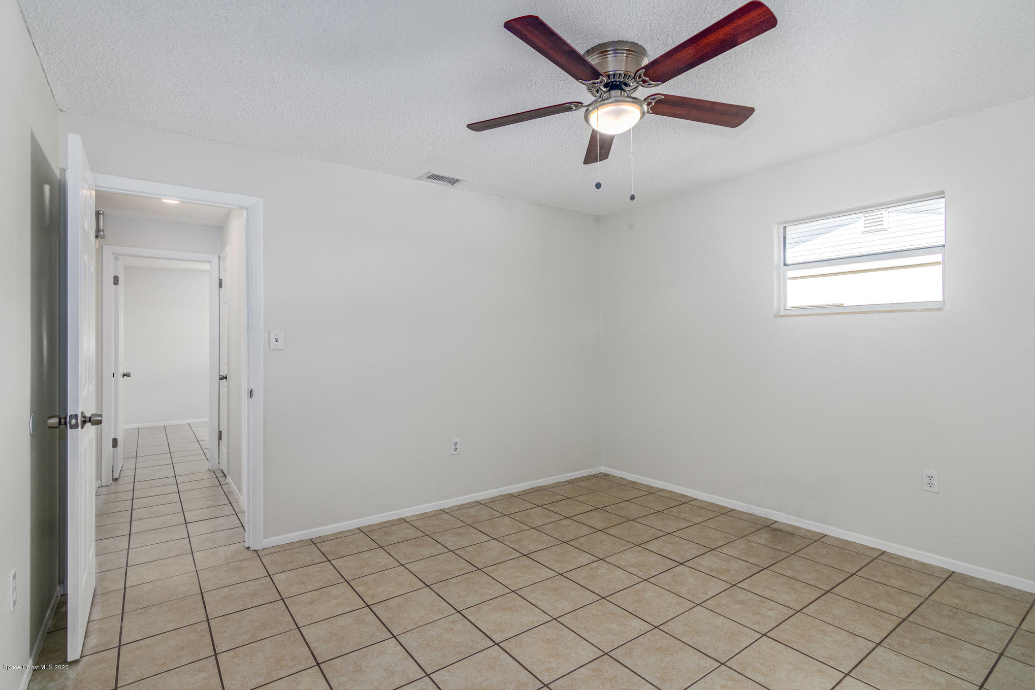 434 Count Street Melbourne, FL 32901 - Photo 21 of 26 wooden floor in an empty room