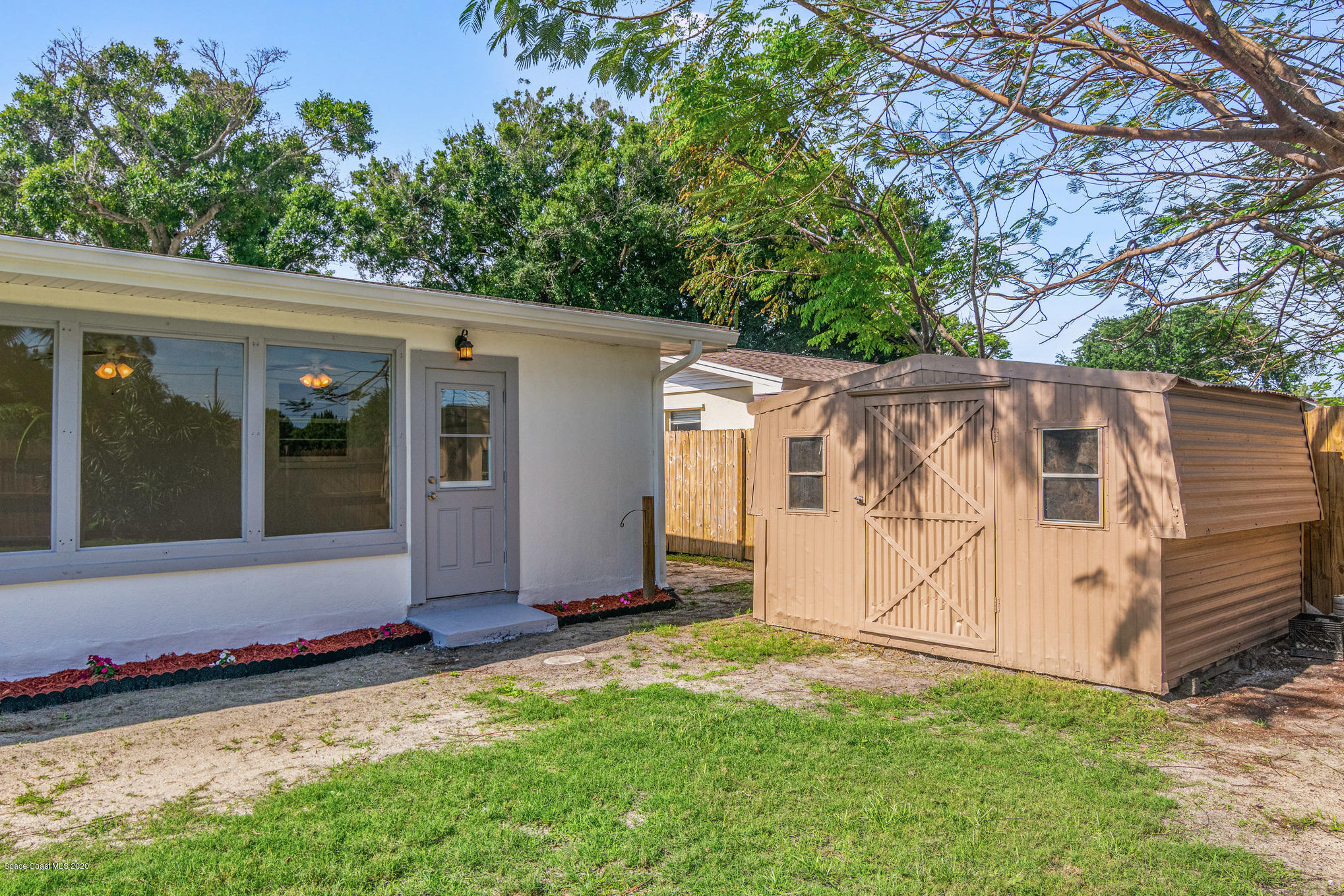 434 Count Street Melbourne, FL 32901 - Photo 25 of 26 a view of a back yard of the house