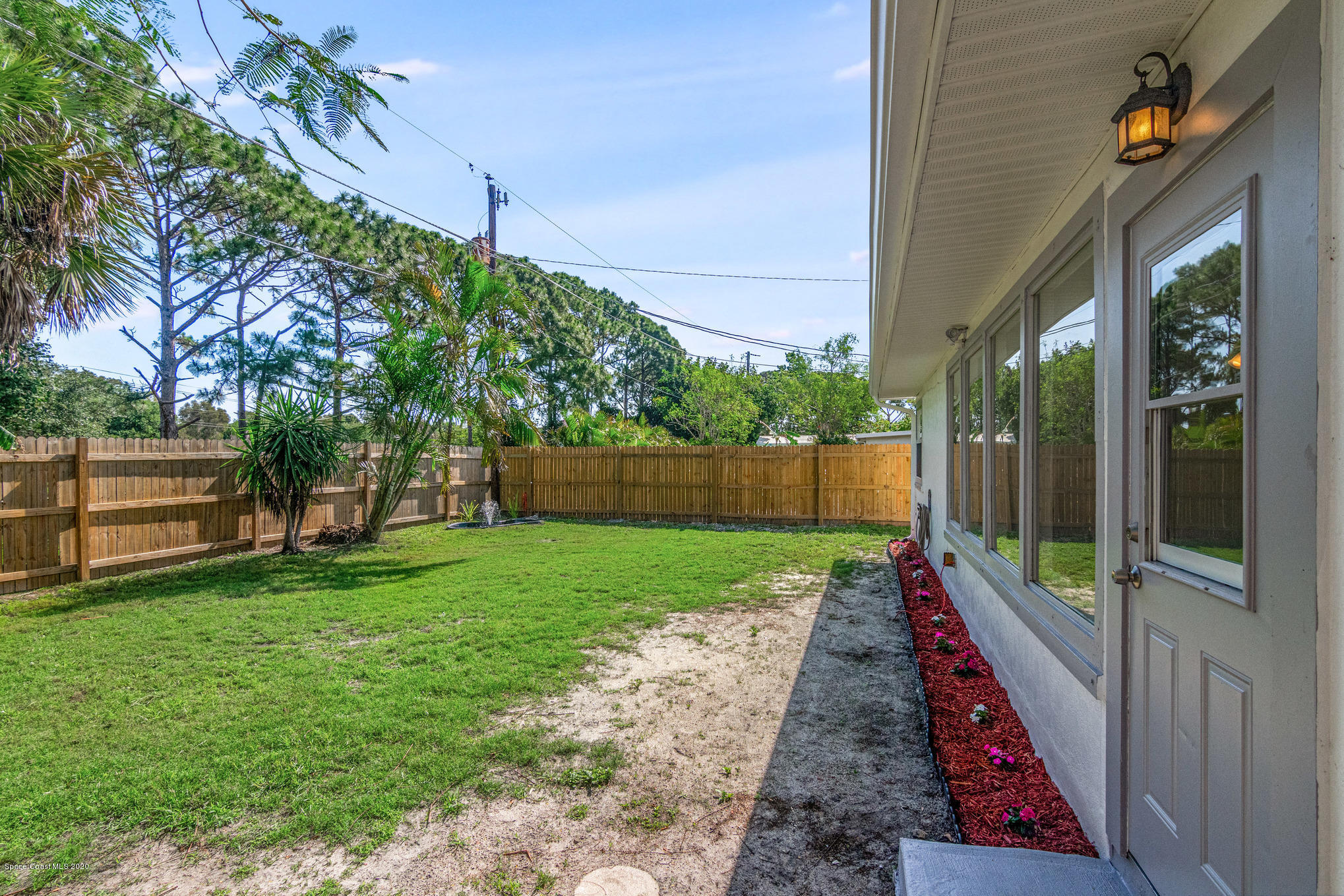 434 Count Street Melbourne, FL 32901 - Photo 26 of 26 a view of a pathway of a house with a yard