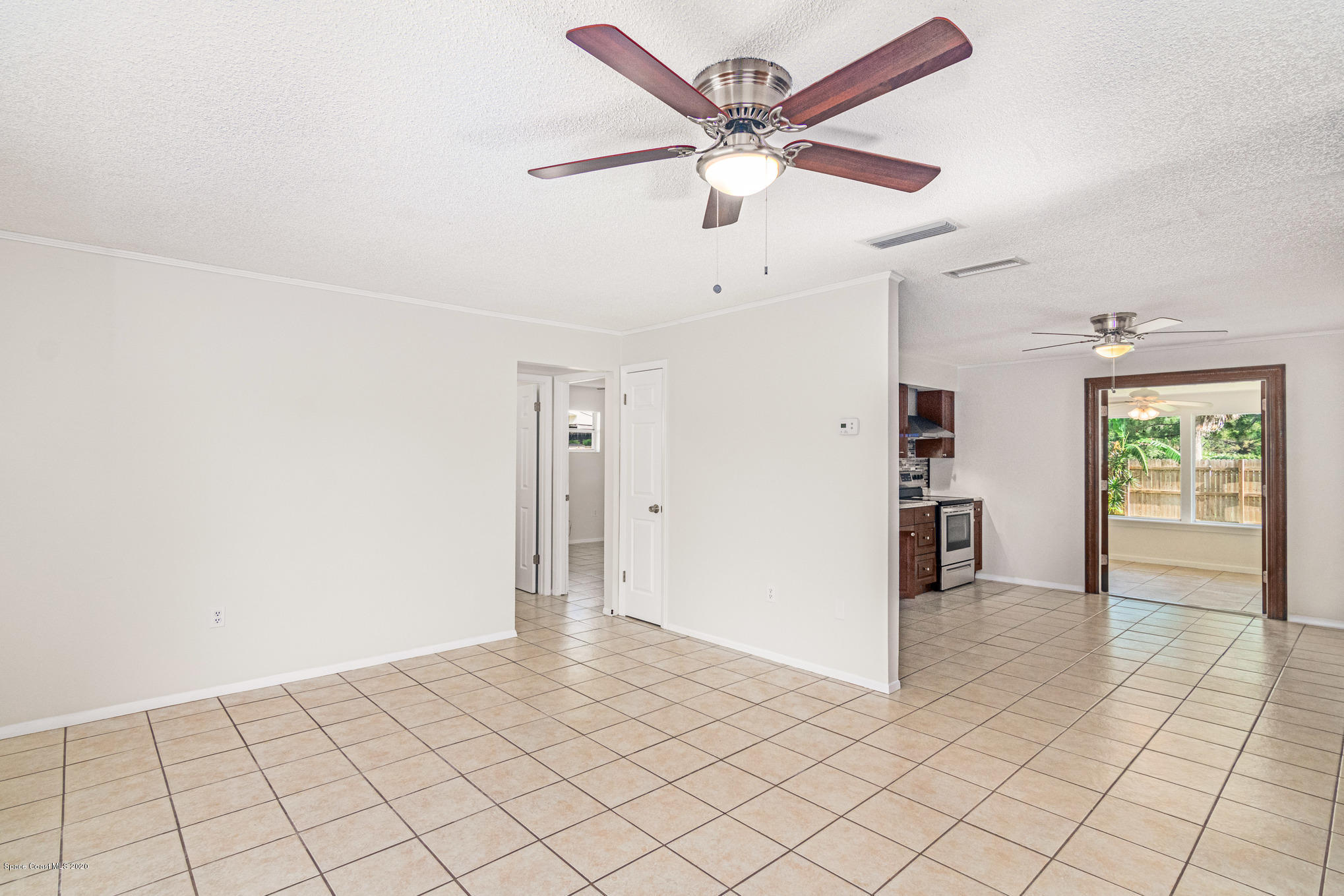 434 Count Street Melbourne, FL 32901 - Photo 5 of 26 a view of an empty room with a window
