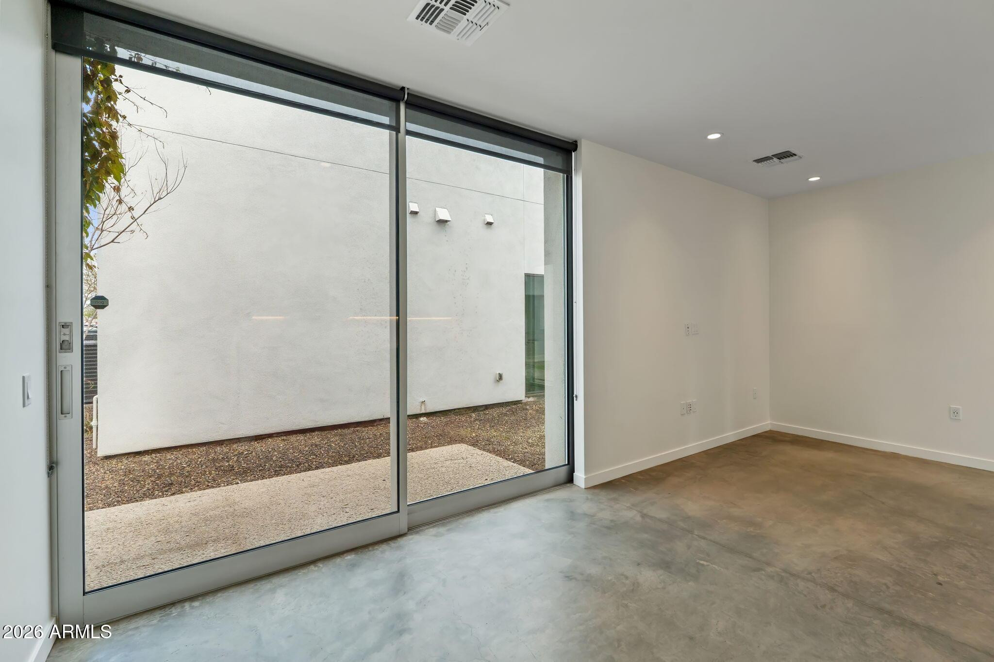 1337 East Polk Street, Unit 7 Phoenix, AZ 85006 - Photo 12 of 25 a view of an empty room