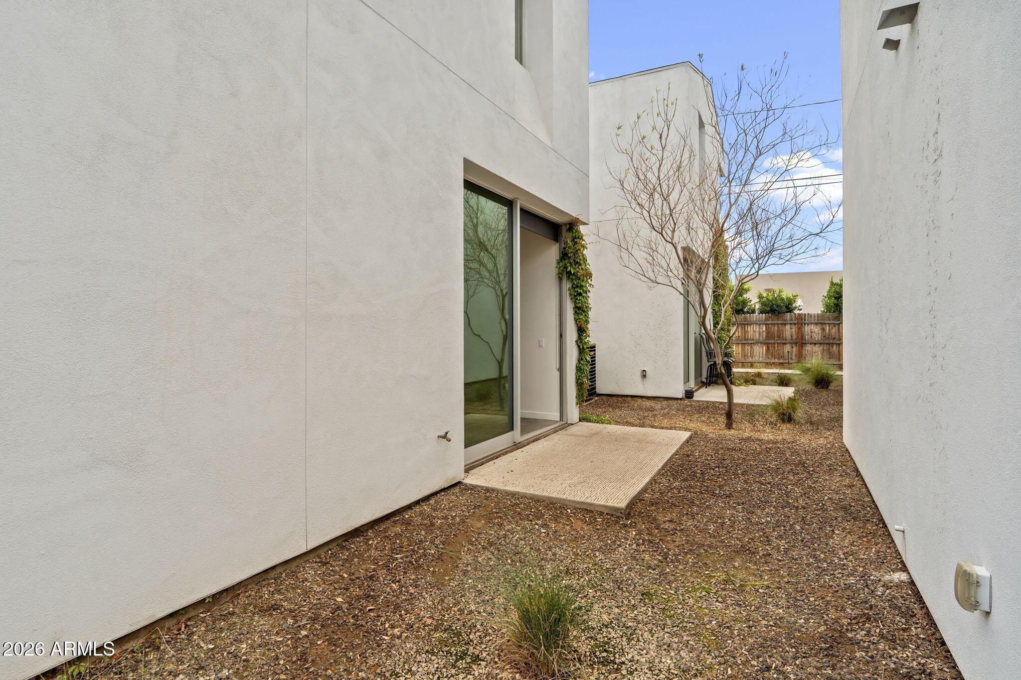 1337 East Polk Street, Unit 7 Phoenix, AZ 85006 - Photo 23 of 25 a view of a big room with windows