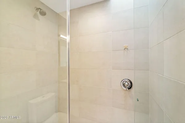 a kitchen with stainless steel appliances granite countertop a sink and a stove top oven