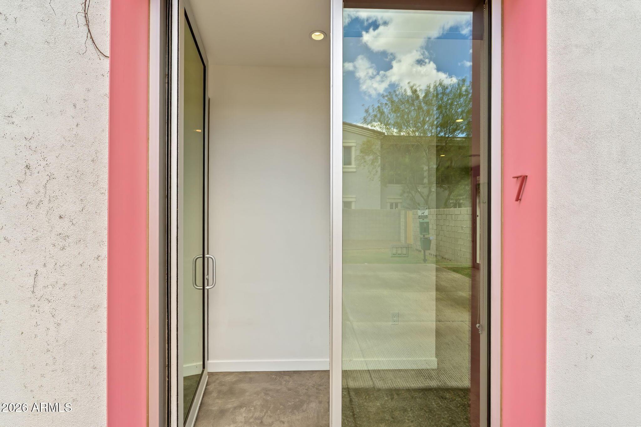 1337 East Polk Street, Unit 7 Phoenix, AZ 85006 - Photo 8 of 25 a bathroom with a glass shower door
