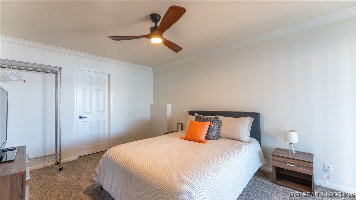 2268 Breezy Acres Road Osage Beach, MO 65065 - Photo 40 of 49 Lower level bedroom 3 with lakeview