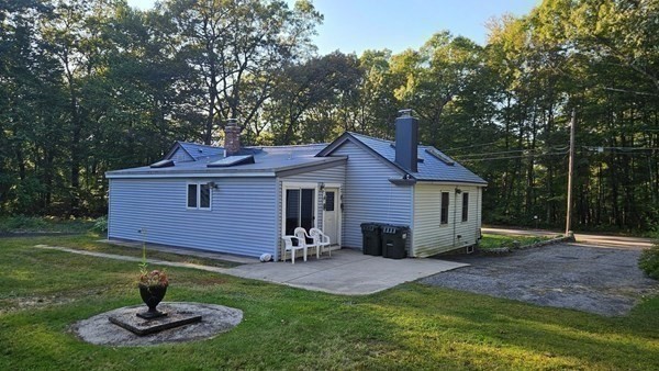 288 High Street Uxbridge, MA 01569 - Photo 13 of 24 a backyard of a house with yard and trampoline