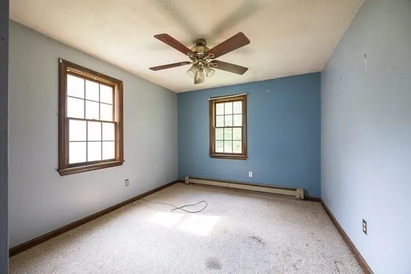 a bathroom with a toilet and a sink