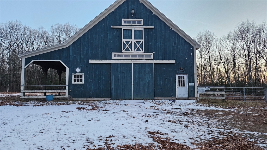 288 High Street Uxbridge, MA 01569 - Photo 2 of 24 a front view of a house with garden
