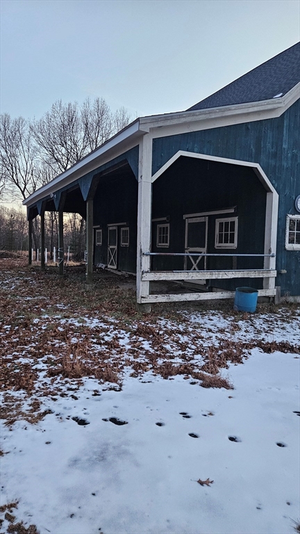 288 High Street Uxbridge, MA 01569 - Photo 3 of 24 a front view of a house with parking space