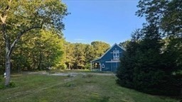 288 High Street Uxbridge, MA 01569 - Photo 5 of 24 a view of a house with a yard