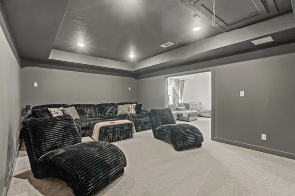 a large bedroom with bed and balcony