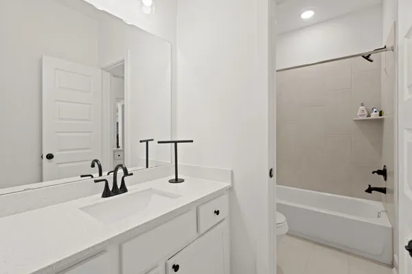a bathroom with a sink and a tub