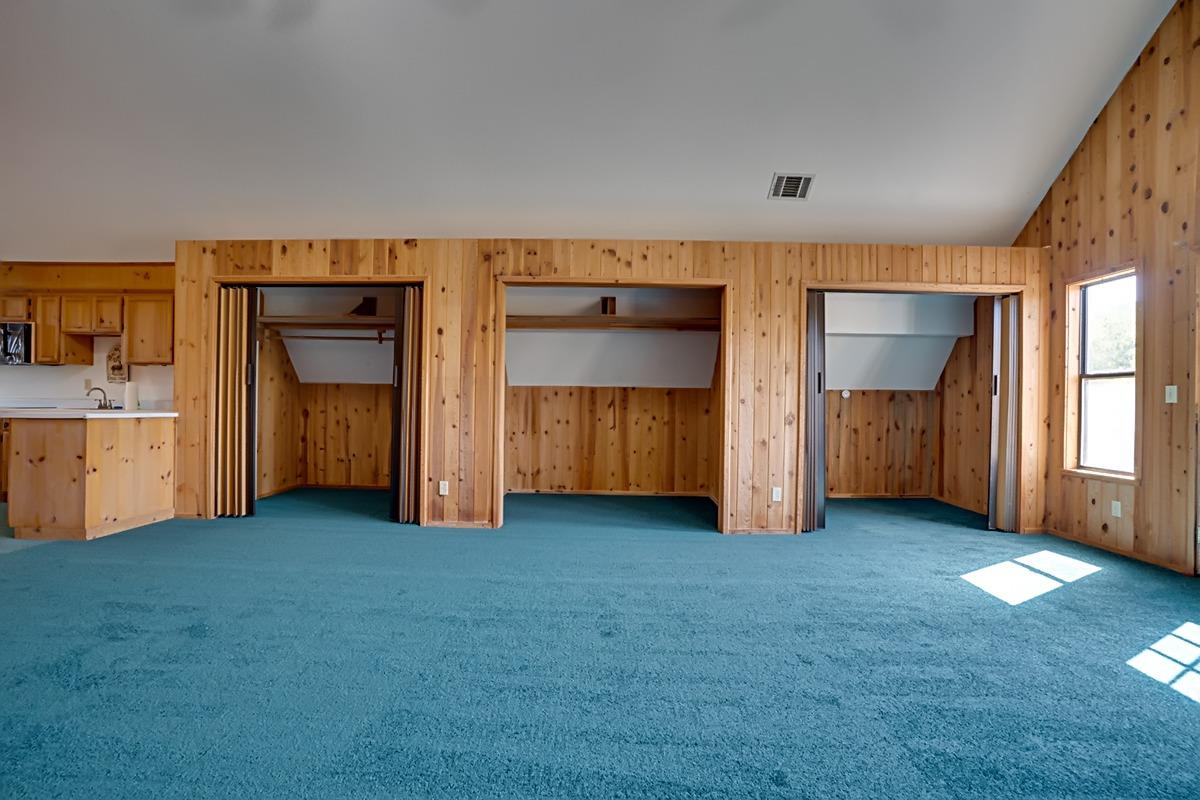 184 Carmel Road Burson, CA 95225 - Photo 11 of 39 a view of an empty room with closet and cabinet