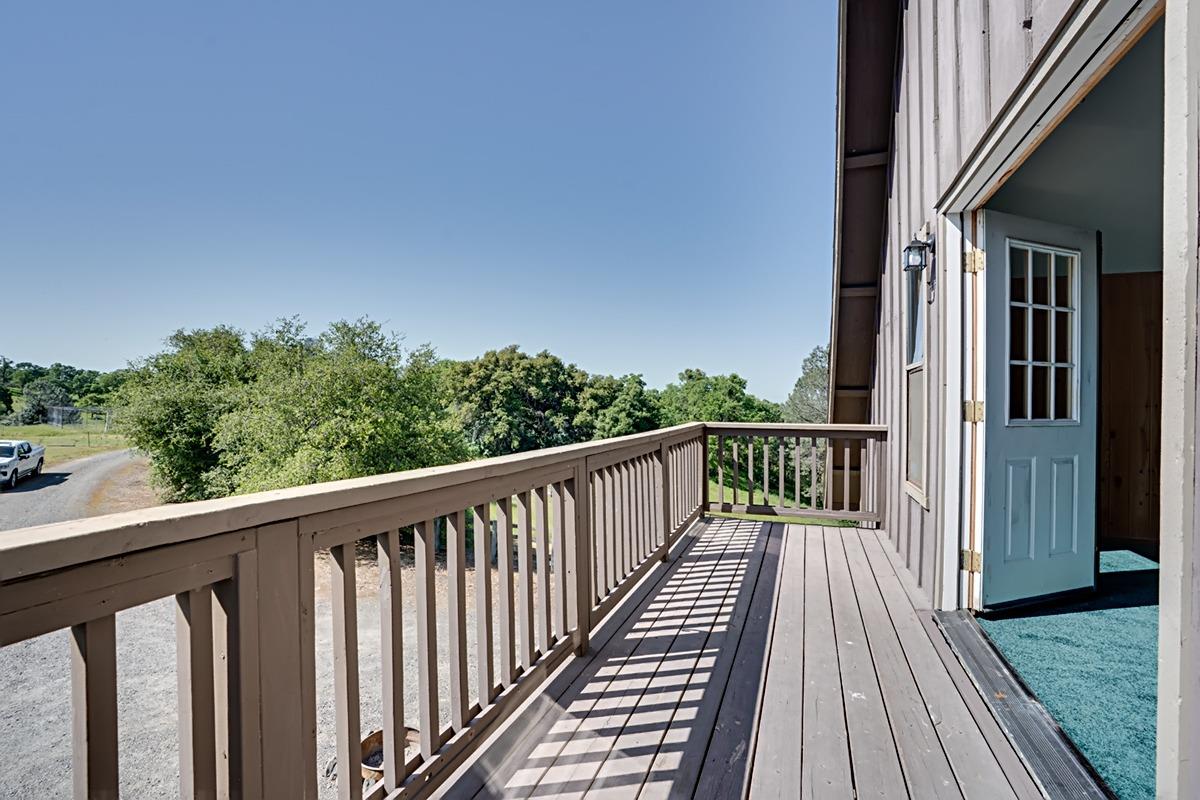 184 Carmel Road Burson, CA 95225 - Photo 13 of 39 a view of balcony with wooden floor