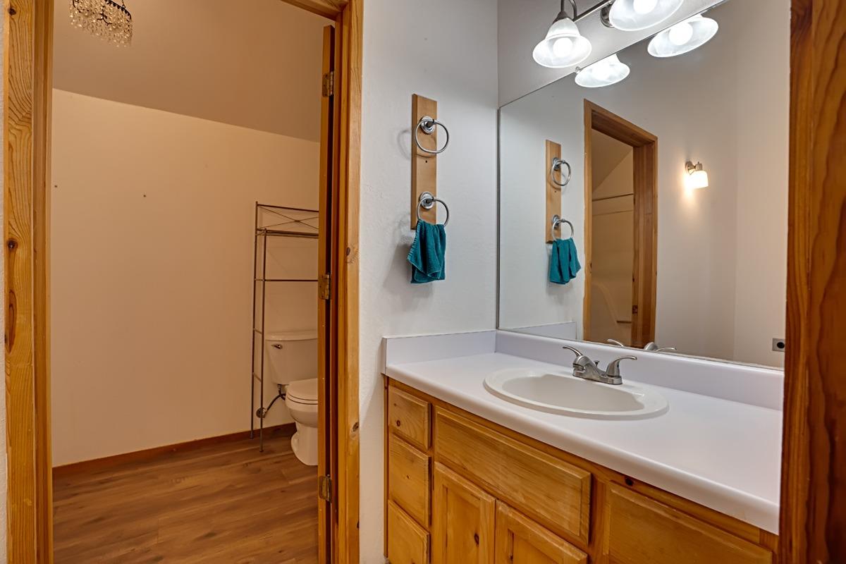 184 Carmel Road Burson, CA 95225 - Photo 19 of 39 a bathroom with a sink and a mirror