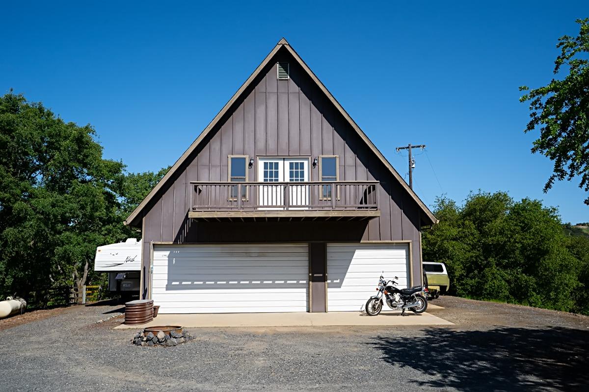 184 Carmel Road Burson, CA 95225 - Photo 2 of 39 a view of a house with a patio