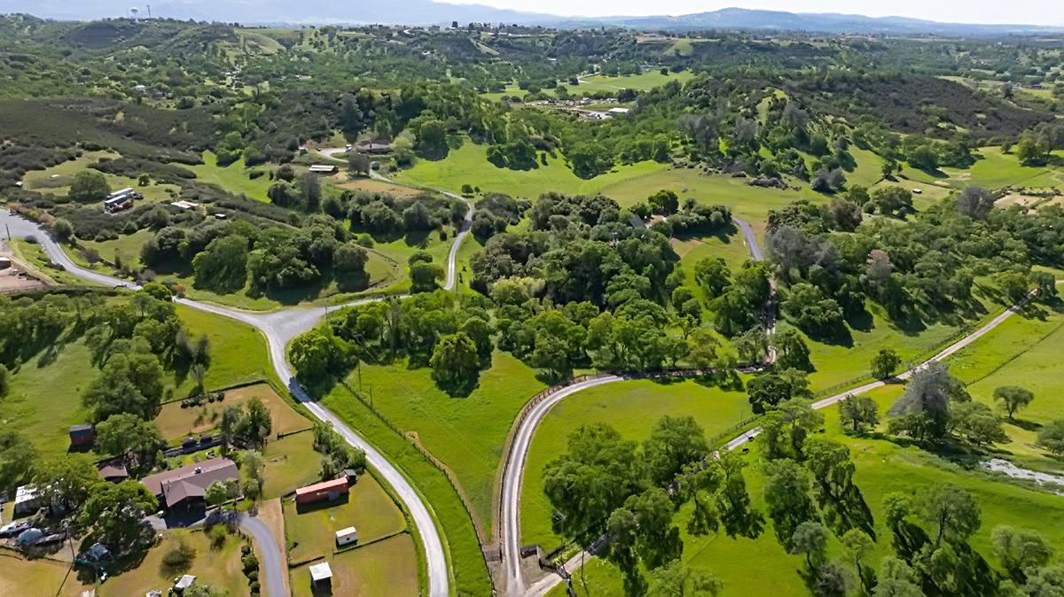 184 Carmel Road Burson, CA 95225 - Photo 21 of 39 an aerial view of a residential houses with outdoor space and trees