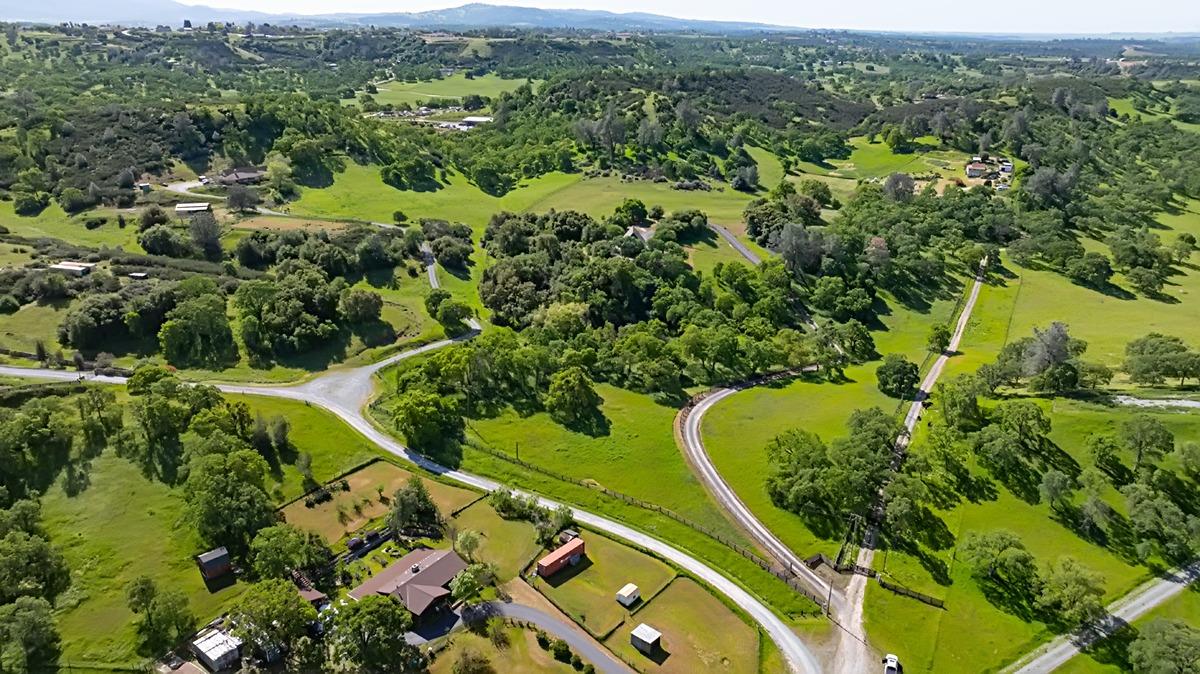 184 Carmel Road Burson, CA 95225 - Photo 22 of 39 an aerial view of a residential houses with outdoor space and trees