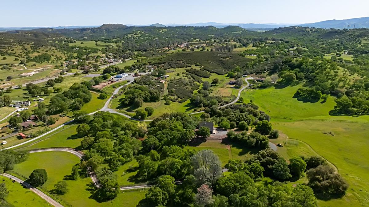 184 Carmel Road Burson, CA 95225 - Photo 24 of 39 a view of a lake with a mountain