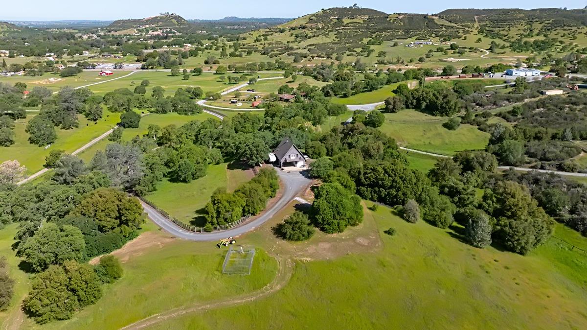 184 Carmel Road Burson, CA 95225 - Photo 31 of 39 an aerial view of residential houses with outdoor space and trees