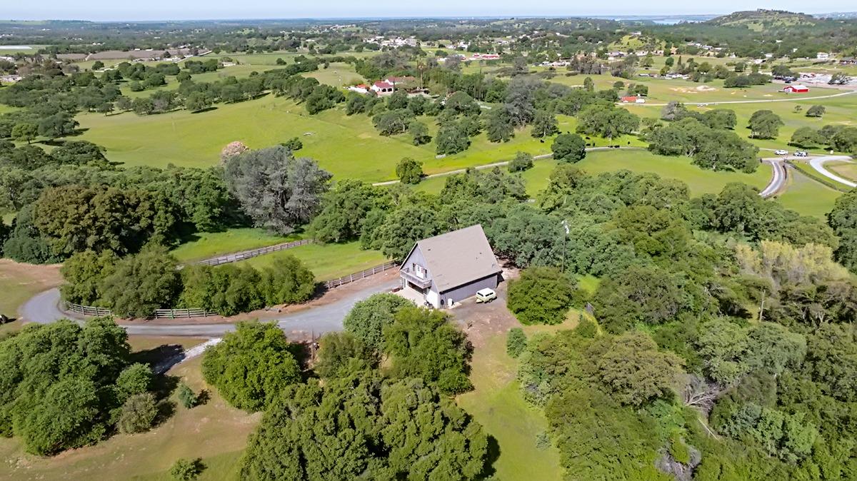 184 Carmel Road Burson, CA 95225 - Photo 36 of 39 an aerial view of residential houses with outdoor space and trees