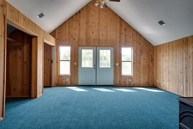 an empty room with windows