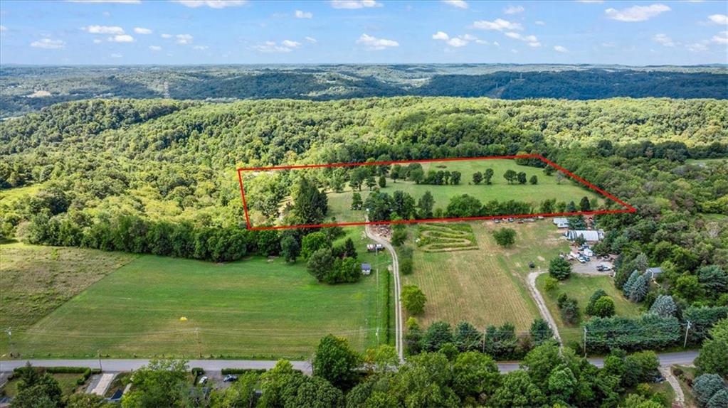 1182 Airport Road Aliquippa, PA 15001 - Photo 11 of 25 a view of a lake from a yard