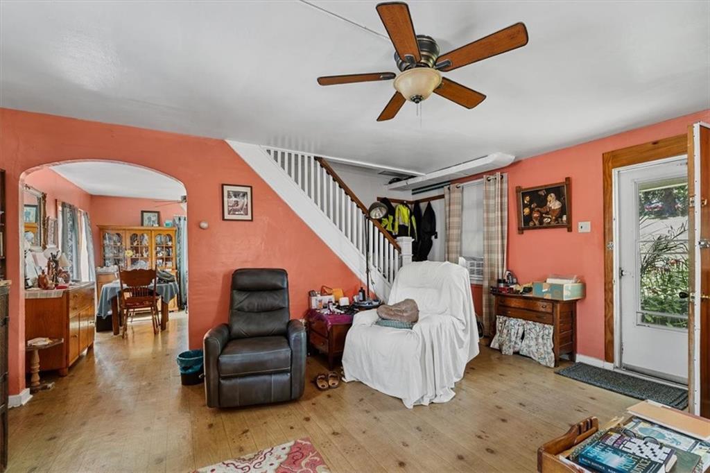 1182 Airport Road Aliquippa, PA 15001 - Photo 12 of 25 a bedroom with furniture and a chair