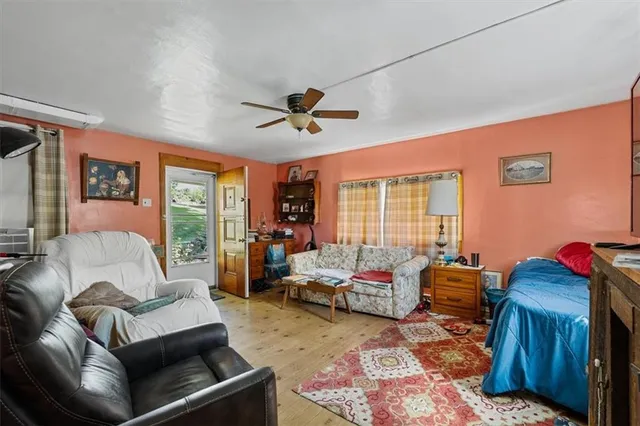 a living room with furniture and a window